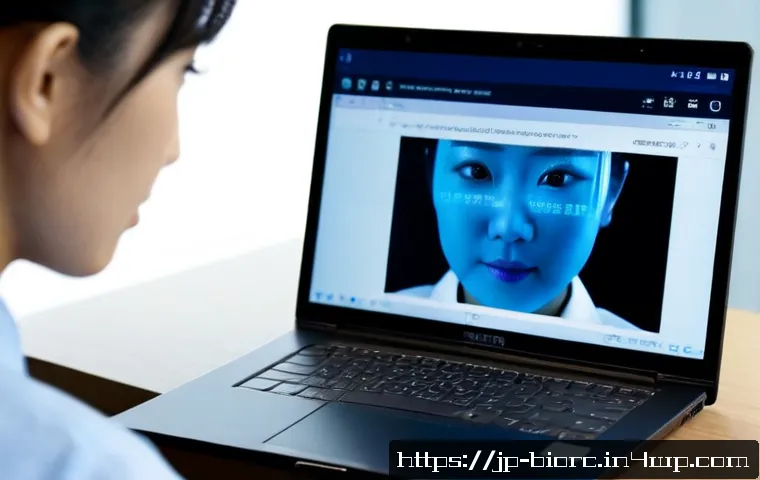 생체인식과 사이버 보안의 관계 - Photorealistic close-up of a Japanese office worker using facial biometric authentication on a sleek...